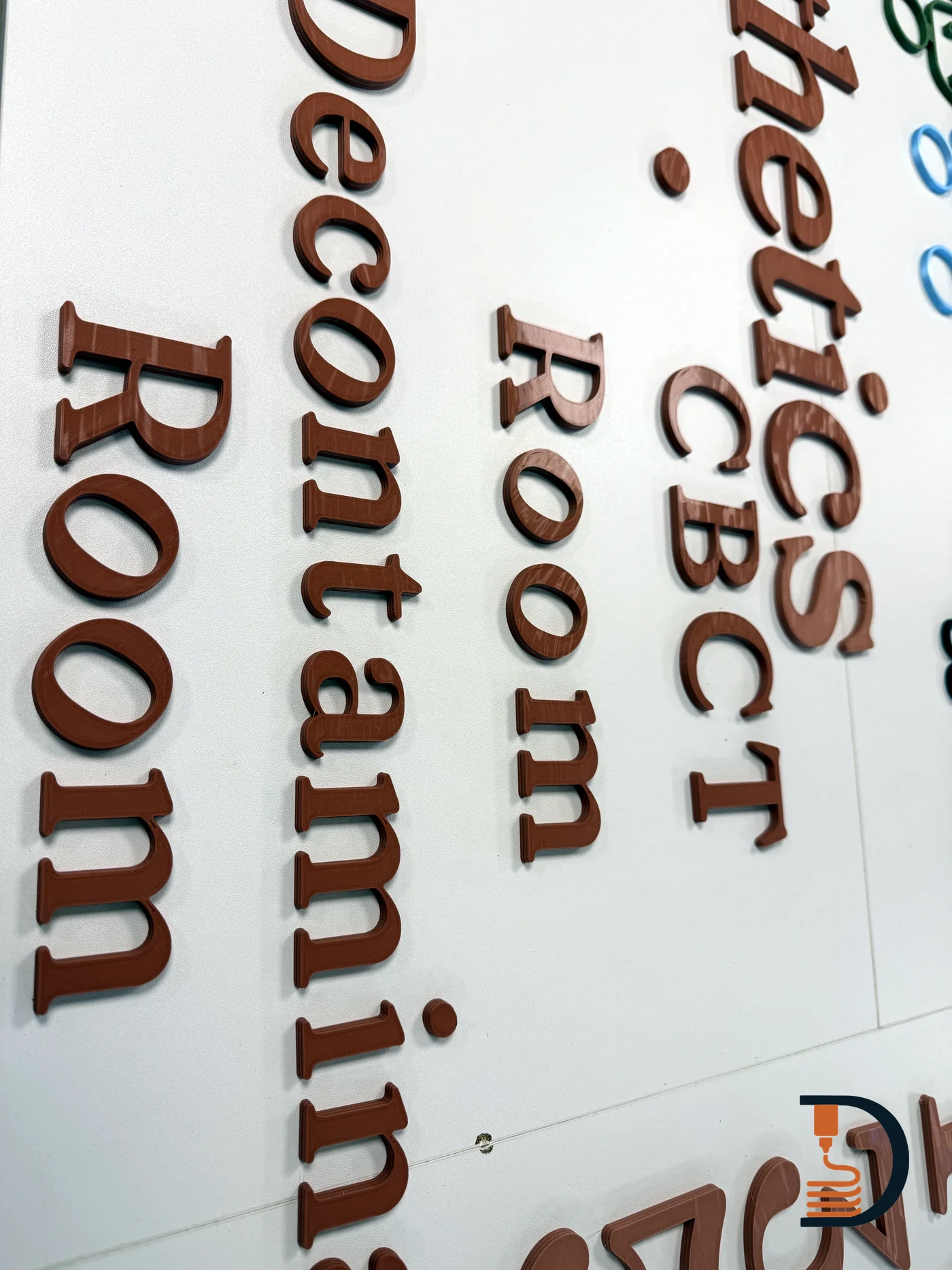 Room lettering fitted to a wall